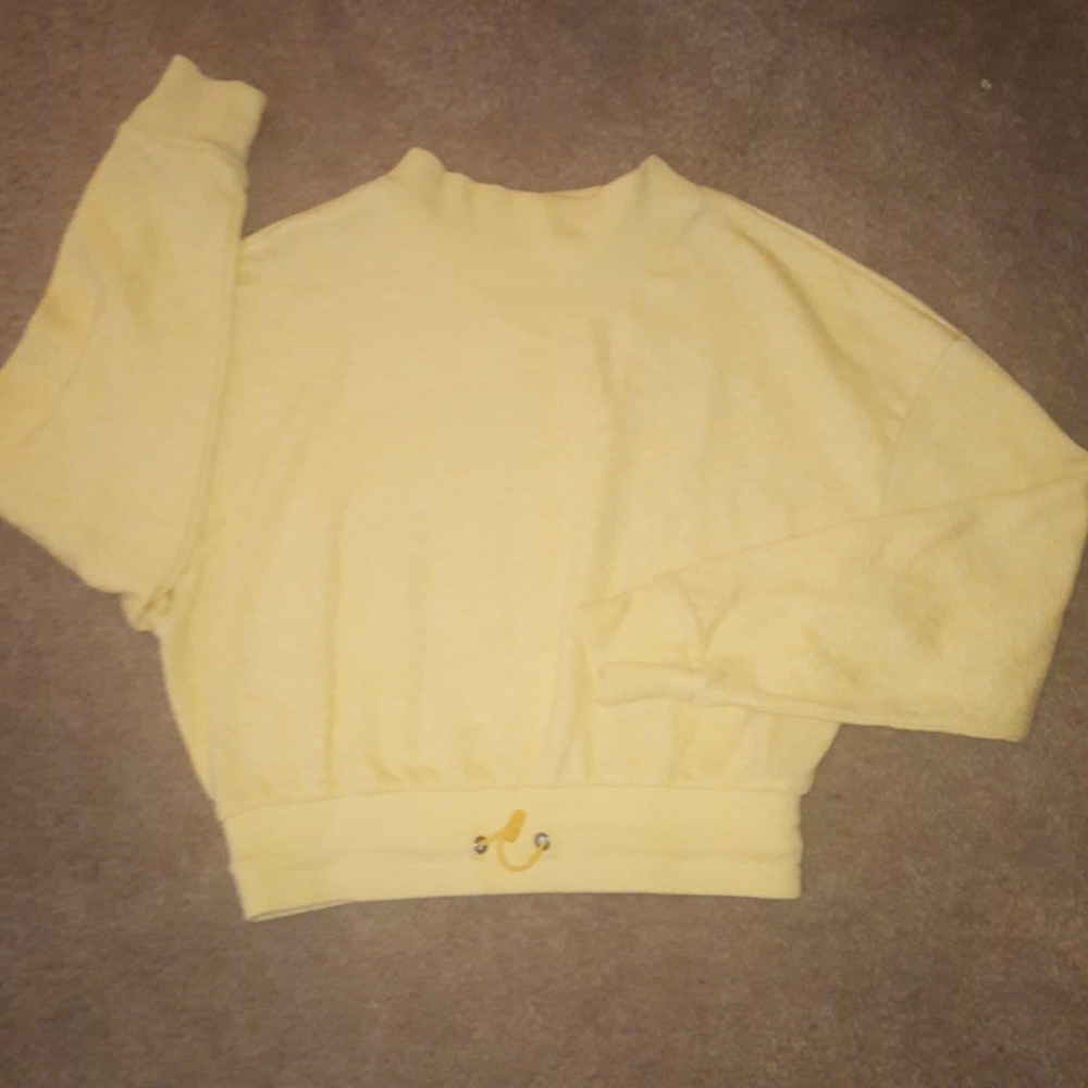 A yellow top, never worn